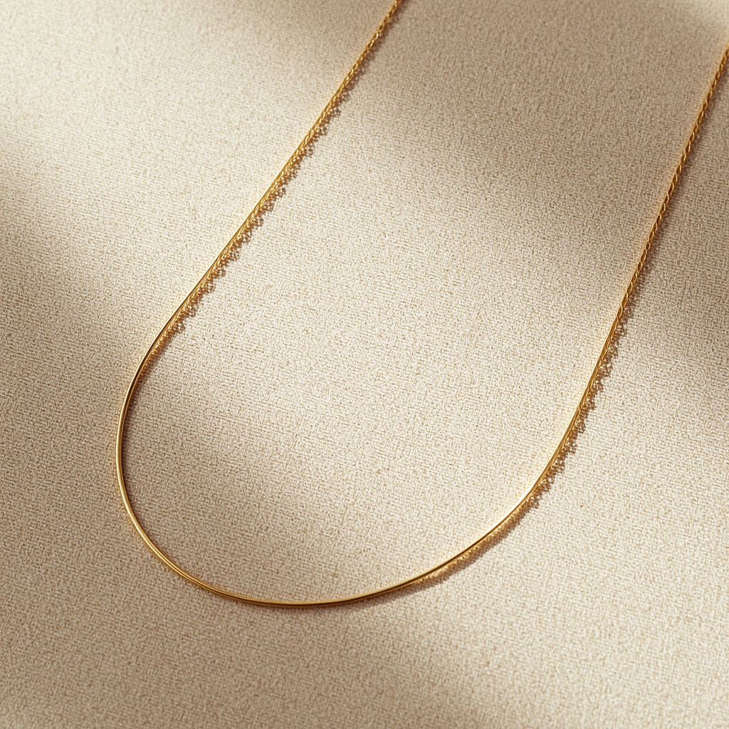 Thin minimalist gold chain necklace, an everyday capsule collection essential
